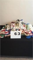 Lot of various kitchen towels and pot holders