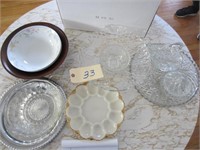 Assorted glass dishes and wooden bowl