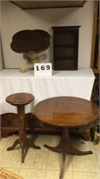 Lot of 4 pieces. 27” tall round table that is