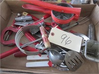 Red wood handle kitchen utensil