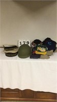 Military hats and a lot of caps