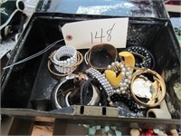 bracelets in tin box