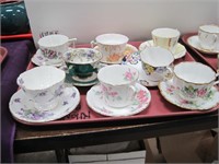 8 different cups and saucers