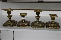 SET OF FOUR CANDLE STICK HOLDERS 5" AND 4"
