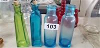 (4) COLORED GLASS BOTTLE LOT