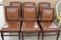 6 ANTIQUE CARVED DINER CHAIRS WITH LEATHER SEATS &