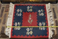 Small wool red white & blue rug