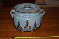 Handcrafted pottery cookie jar w/ evergreens