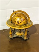 small wood globe on stand