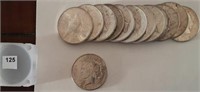 13 Mixed Date Silver Peace Dollars, one money