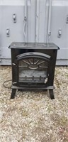Small vintage style electric heater.