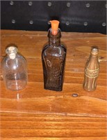 Three miniature bottles