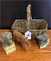 Wicker basket with elephants and rhino figurines