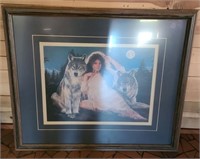 Framed Signed  print of a lady and wolves