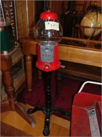 gumball machine on cast stand
