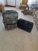 LARGE ZEPHYR LUGGAGE AND A BLACK SUITCASE