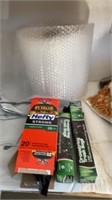 ROLL OF BUBBLE WRAP AND 3 CONTAINER OF TRASH BAGS