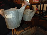 (2) galvanized watering cans
