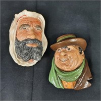 Two Chalkware Head Wall Hangings