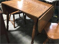 Wood dining table with leaf and two chairs