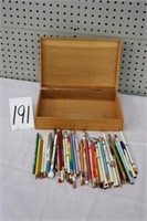 PENCILS  AND A WOODEN BOX