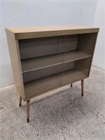 Mid century modern bookcase with sliding glass