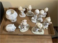 10 Precious Moments' porcelain figurines