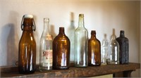 8 Vintage Stoeckers Soda, Bitters, Beer Bottles