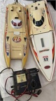 RC remote boats, one has new battery