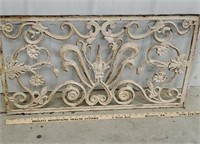 Ornate cast iron window grate
