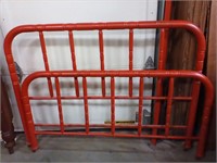 Red metal twin bed frame w/ rails