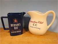 TWO STONEWARE WHISKY ADVERTISING JUGS