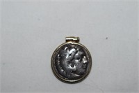 Silver Coin inside Securing Device - Not a Pendant