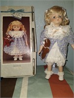 Collectible Porcelain Doll “Torn Teddy”