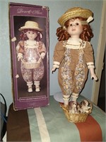 Collectible Porcelain “Penny and Puppies” doll