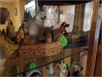COLLECTION OF INDIAN BOAT AND WOLF FIGURINES