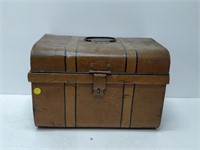 tin travel case (looks like wood grain)