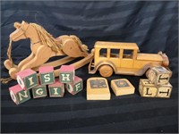 Wooden car, rocking horse and blocks.