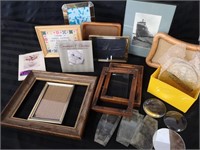 Large lot of picture frames and glass pieces.