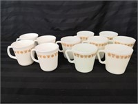 11 coffee mugs, Corning and Pyrex.