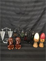 Five pairs of unique salt and pepper shakers.