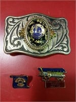 Lions Club belt buckle and puns