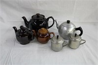 Assortment of teapots and 2 tea diffusers