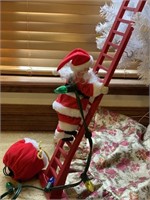 Electric Santa climbing ladder