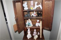 Contents of Hall Cabinet. Mostly Dog Figurines.