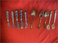 Silver spoons forks, and sm. Silverware