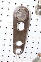 Hubcab wrench with Ford script