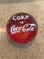 "Coke is Cola Cola" paper weight