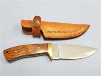 fixed bladed knife, brass slotted guard, wood scal