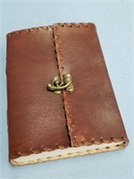 Leather bound journal, approx. 7" long